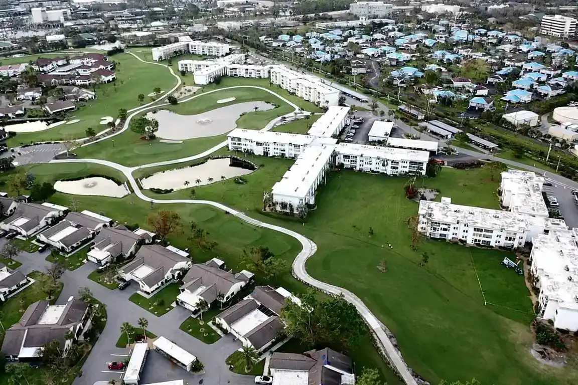 Pro Exteriors crew on a completed commercial low-slope roofing project